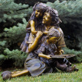 Life size garden bronze vintage sculpture of a mother and child girl